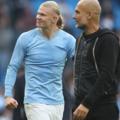  Pep Guardiola et Erling Haaland, de Manchester City, célèbrent la victoire de leur équipe.