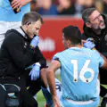 Rodri of Manchester City receives medical treatment to an injury before being substituted during the Premier League matc