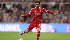 Curtis Jones of Liverpool passes the ball during the Premier League match