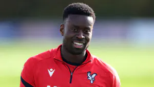 Marc Guehi of Crystal Palace smiles in a training session at Crystal Palace FC