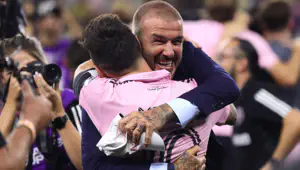  Co-owner David Beckham hugs Lionel Messi #10 of Inter Miami after defeating Nashville SC