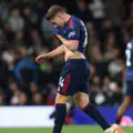 Viktor Gyoekeres of Arsenal wipes his face with his shirt as he leaves the field whilst being substituted during the Premier League match