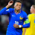 Kylian Mbappe of France celebrates scoring his team's first goal from the penalty spot during the FIFA World Cup 2026 qualifier match 