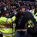 Swiss fans go wild! Young Boys supporters clash with police at Villa Park