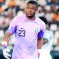 Nigerian goalkeeper Nwabali roughly takes down opponent but escapes a red card. What happened?