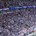 Atletico fans give Arsenal a wild Champions League welcome and shower the pitch with paper
