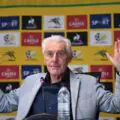 HJugo Broos cuts a frustrated figure as Fifa rules Themba Zwane will be out for three matches which means his World Cup is over