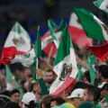 Bizarre moment! Ceremony participant gets stuck under flag right on the pitch